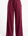 Jogger dama corte recto guinda
